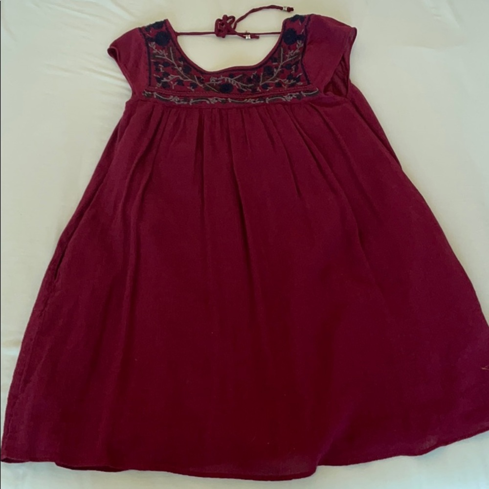 Burgundy dress with embroidered details